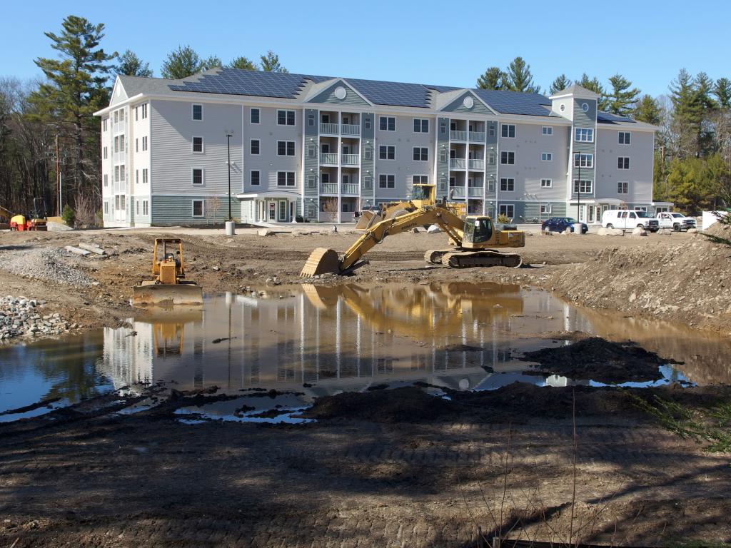 residential building under construction next to Londonderry Rail Trail in southern New Hampshire