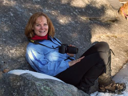 Kim taking a photo on Lookout Ledge in New Hampshire