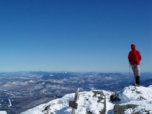 in early March Fred dons face mask and googles (hey, it's cold and windy) way up atop Mount Madison in the White Mountains of New Hampshire