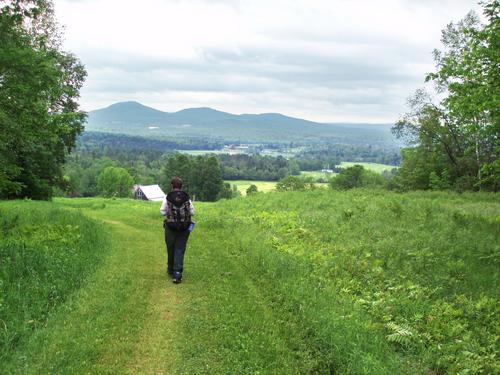 hiker heading down from Mount Mary in New Hampshire