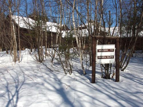 winter view of the main lodge at Mayhew Island on Newfound Lake in New Hampshire