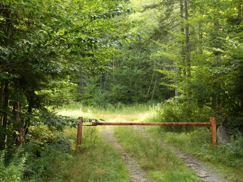 road gate a hike start to Melvin Hill in New Hampshire