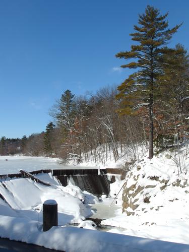 the falls in winter at Mine Falls Park in New Hampshire