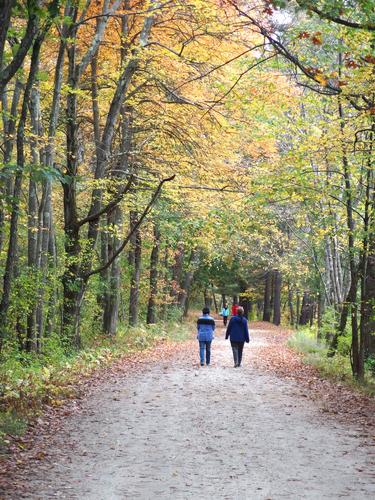 Nona and Betty Lou head down the main path towards Soifert Field at Mine Falls Park in New Hampshire