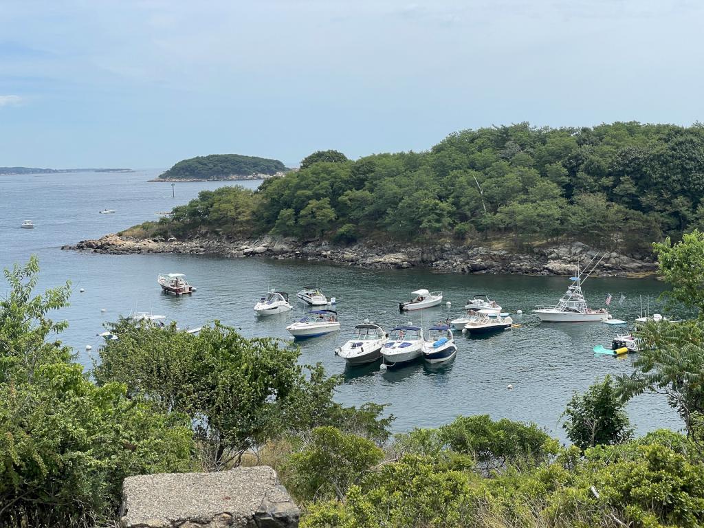 pleasure boats anchored in North Cove in July at Misery Island in northeast MA