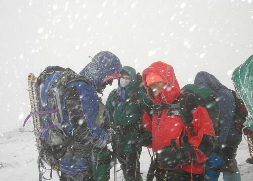 winter hikers on Mount Monroe in New Hampshire