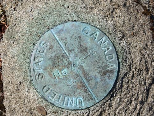 boundary marker on Montagne des Lignes in northern New Hampshire