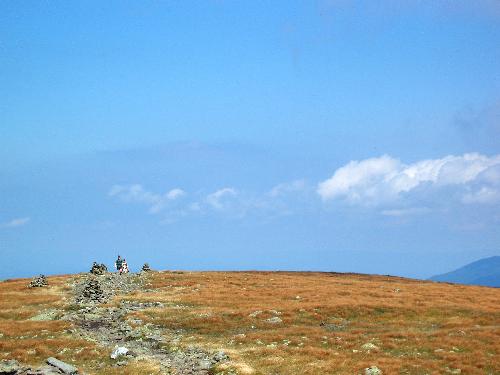 two hikers crest the Beaver Brook Trail to Mount Moosilauke in New Hampshire