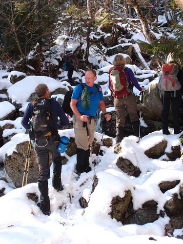 hikers on the trail to Mount Nancy in New Hampshire