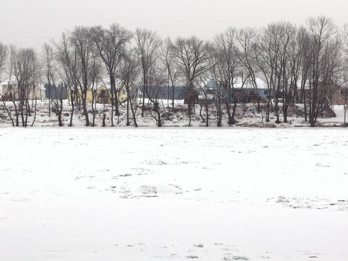 view from the Greeley Park boat launch across the Merrimack River to Hudson in southern New Hampshire