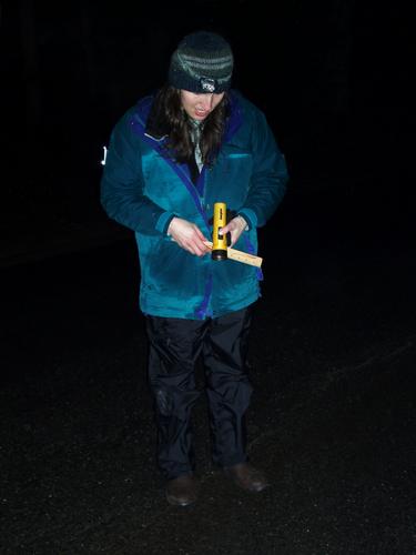 volunteer helping Spotted Salamanders cross the road