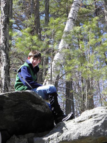 hiker on the trail to North Pack Monadnock Mountain in New Hampshire