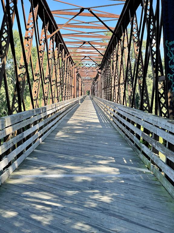 long bridge over the Connecticut River in September at Norwottuck Rail Trail near Northampton in northern Massachusetts