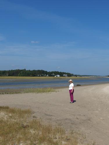 hiker on Ogunquit Beach in southern coastal Maine