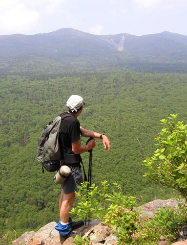 hiker and view from Owl's Head Path in New Hampshire