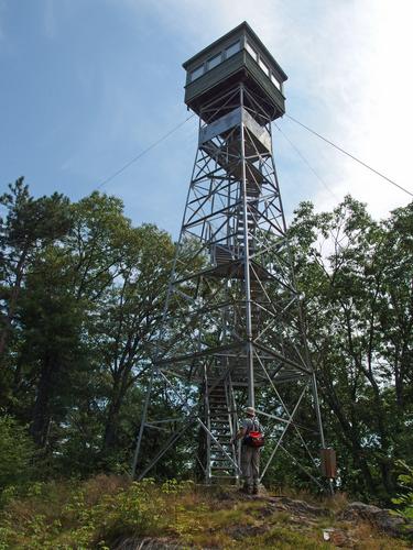 Dick at the fire tower atop nearby Craney Hill near Pats Peak in New Hampshire