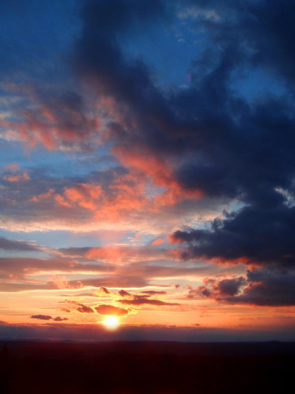 sunset as seen from Pawtuckaway South Mountain in southern New Hampshire