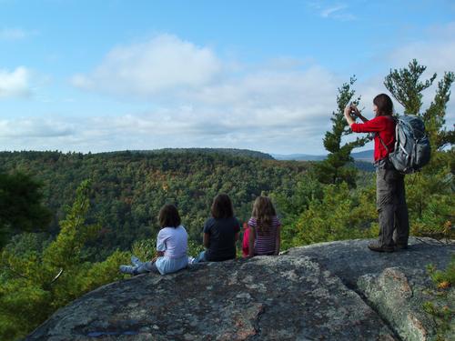 hikers on Pawtuckaway South Mountain in New Hampshire