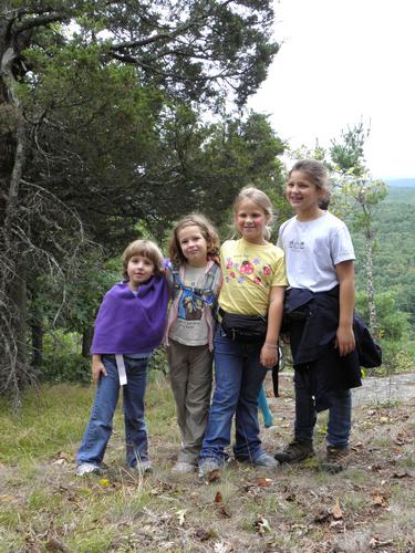 hikers on Pawtuckaway Middle Mountain in New Hampshire