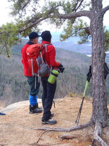 hikers and view from Peaked Mountain in New Hampshire