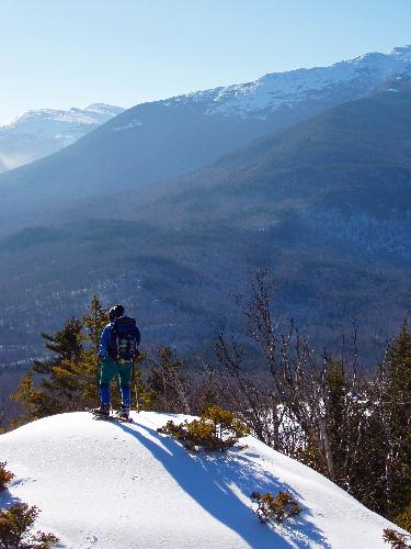 hiker and view from Pine Mountain in New Hampshire