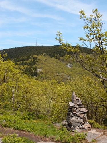 view of the Belknap Mountain communications tower from Piper Mountain in New Hampshire