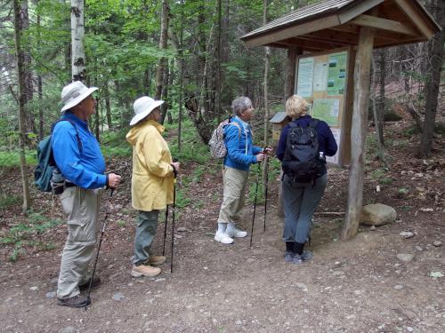 hikers at the kiosk on the way to Pitcher Mountain in New Hampshire