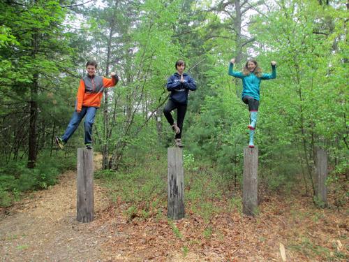 Ben, Sara and Mia frolic at Ponemah Bog in southern New Hampshire