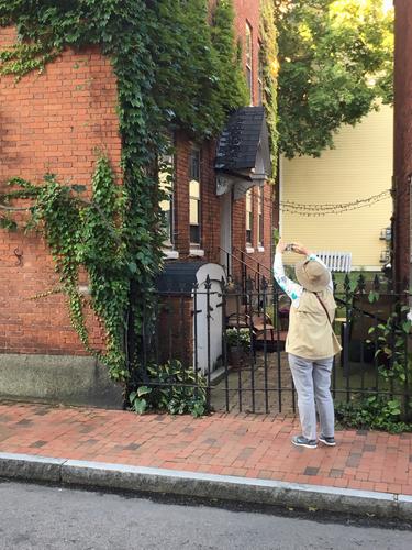 Andee takes a building photo at Strawbery Banke Museum at Portsmouth in New Hampshire