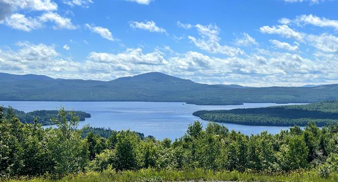 view east over First Connecticut Lake toward Magalloway Mountain in June from Prospect Mountain in northern New Hampshire