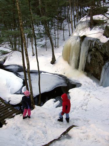 winter hikers at Pulpit Rock Conservation Area in New Hampshire