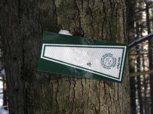 SRKG sign on the trail to Ragged Mountain in New Hampshire