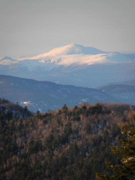 view of Mount Washington in March as seen from Mount Roberts in New Hampshire