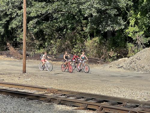 bikers in August at Roussel Field and River Walk in Nashua NH