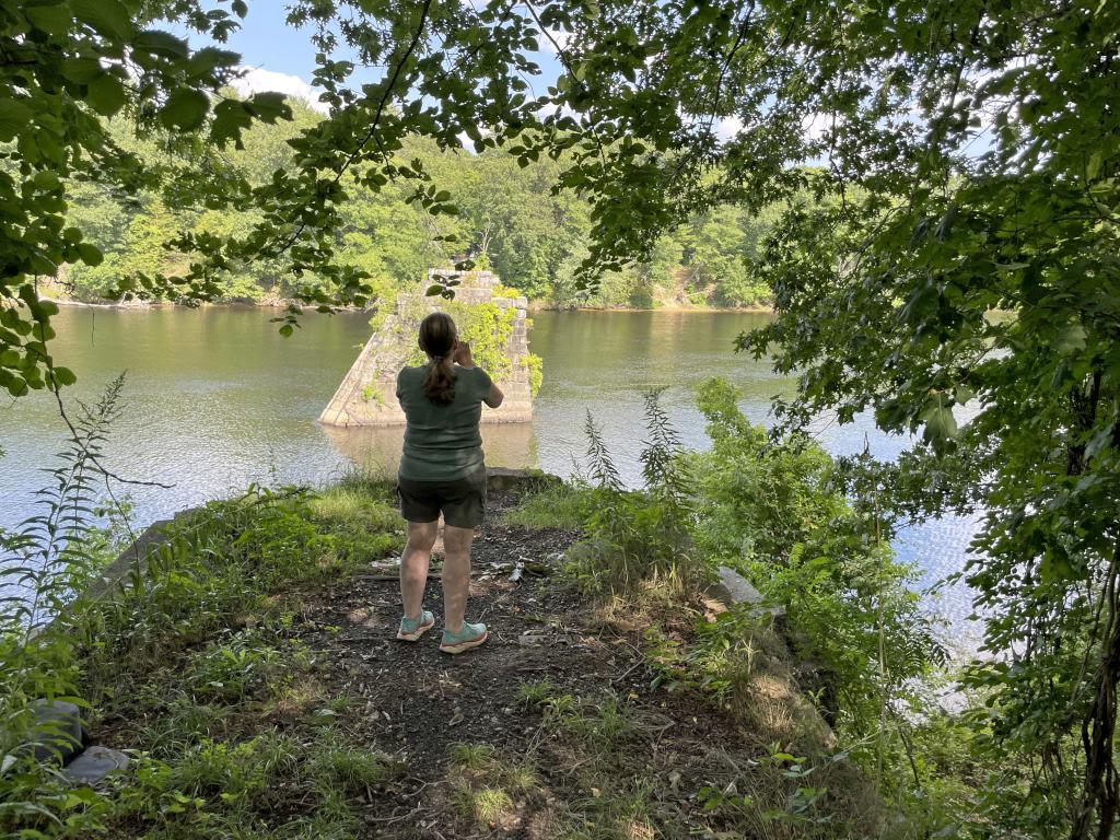 Andee photographs piers in the Merrimack River in August at Roussel Field and River Walk in Nashua NH