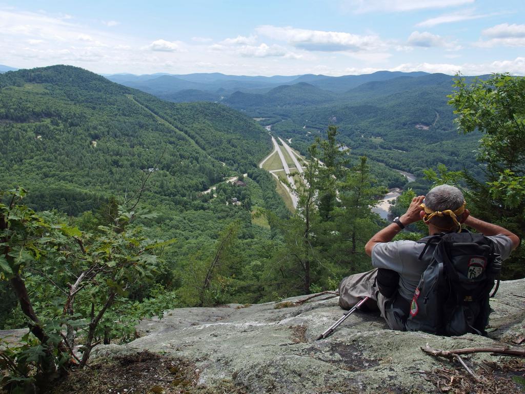 Dick photographs the view south from Russell Crag near Franconia Notch in New Hampshire