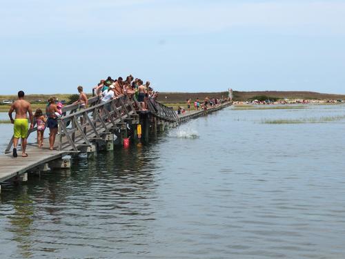 kids playing on Sandwich Boardwalk at the town of Sandwich on Cape Cod in eastern Massachusetts