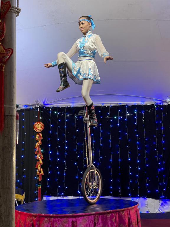 unicycle gymnast in October 2022 at Southwick's Zoo in eastern Massachusetts