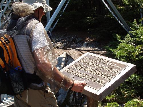 hiker with bug netting on Stratton Mountain in Vermont