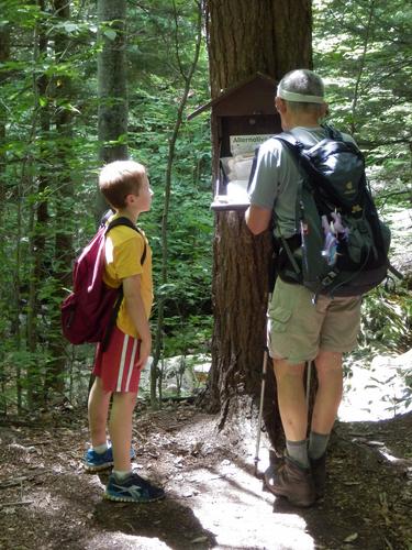 hikers at the trailhead register on the Andrew Brook Trail to Mount Sunapee in New Hampshire