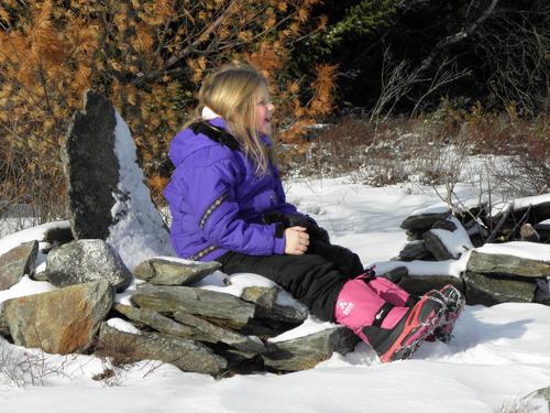 winter hiker on Temple Mountain in New Hampshire