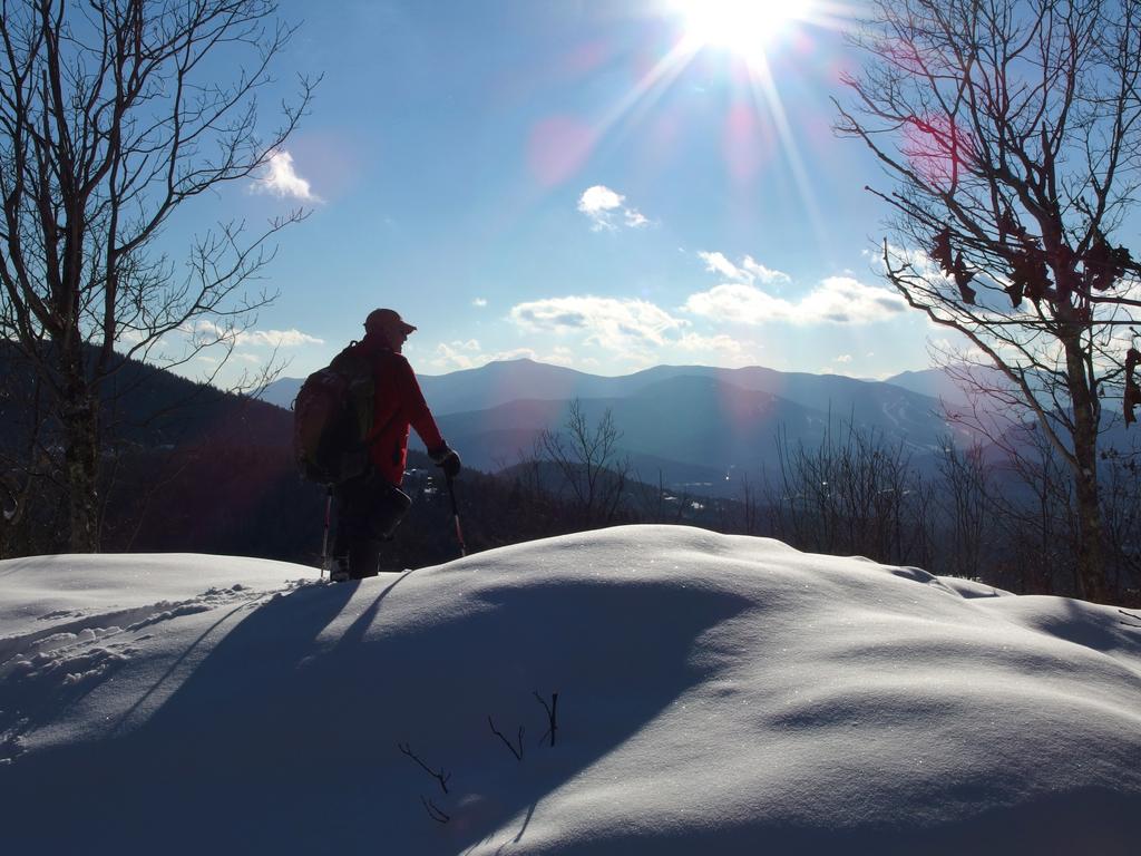 Chuck checks out the view from the summit of Tin Mountain in New Hampshire