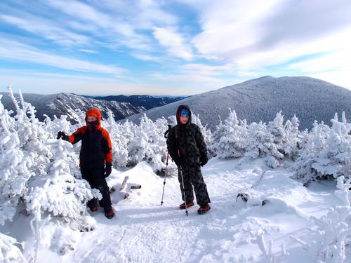 hikers on top of Mount Tom in New Hampshire