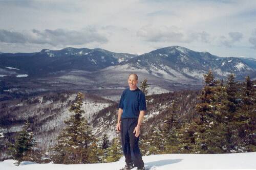 hiker and view from Mount Tremont in New Hampshire