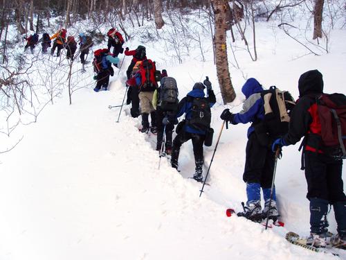 breaking trail to Mount Tripyramid in New Hampshire