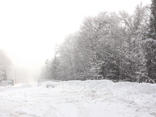 overflow parking lot in winter for hiking North Uncanoonuc Mountain in New Hampshire