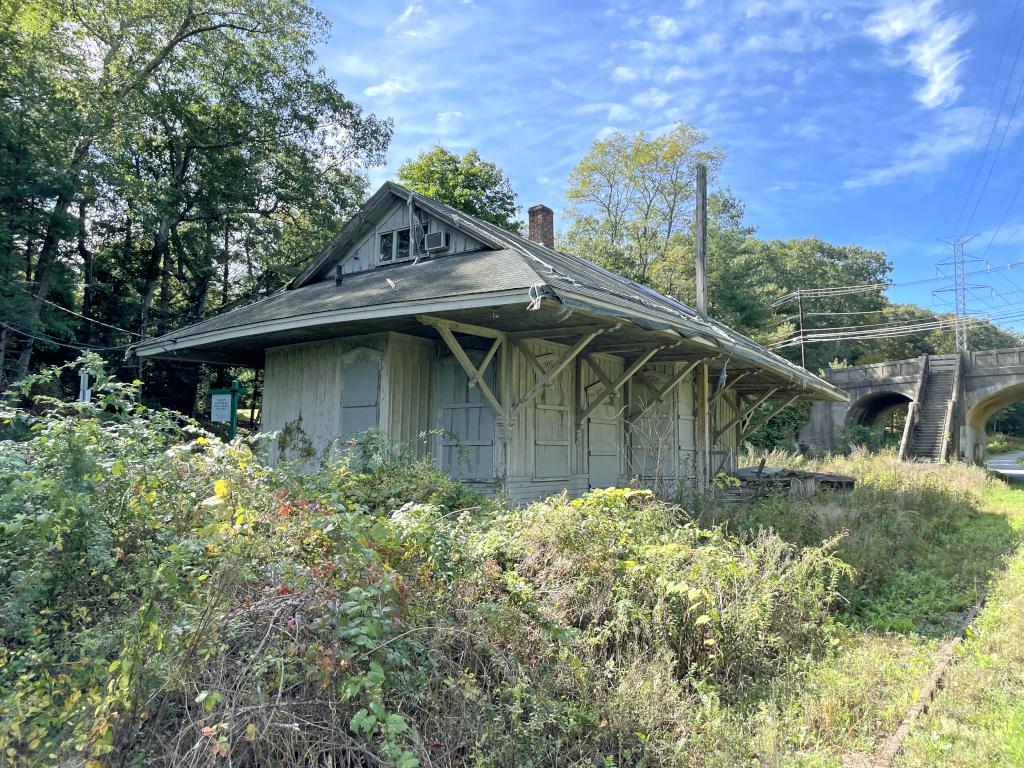 unrestored railroad station in October at Wayland Rail Trail near Wayland in eastern MA