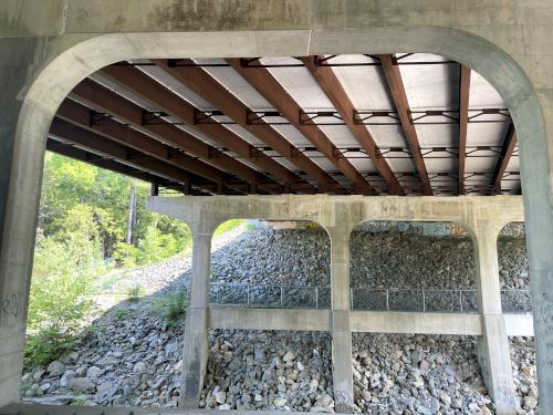 trail under Everett Turnpike in May at Wildcat Falls in southern New Hampshire