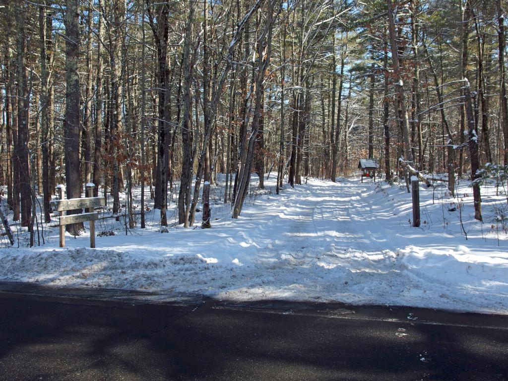 entrance in February to the trailhead parking lot for Windham Town Forest in southern New Hampshire