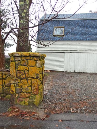 lichen-covered stone post at York Harbor in southern Maine